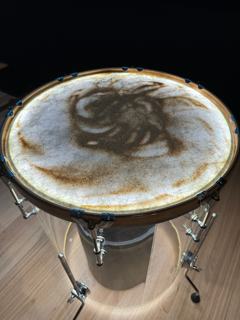 sand sitting on top of a drum