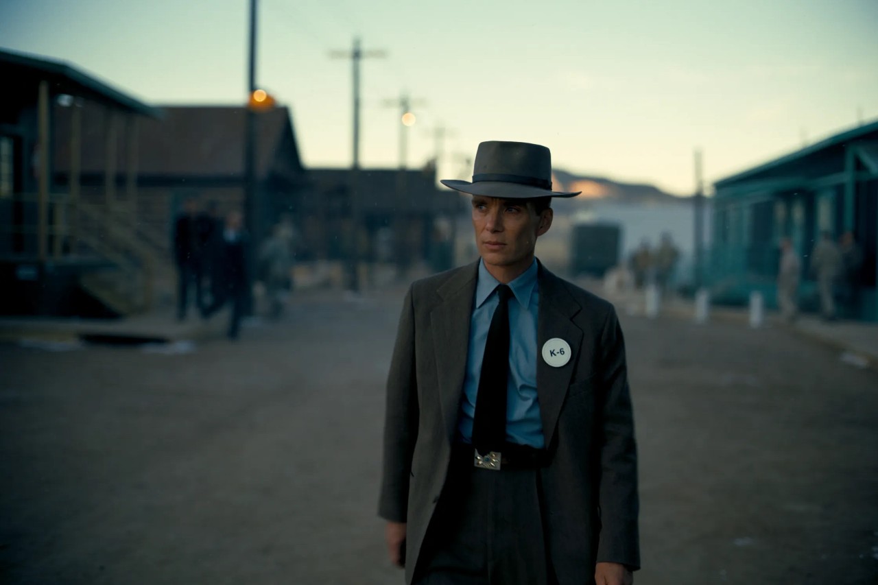 an actor walks in a dark environment