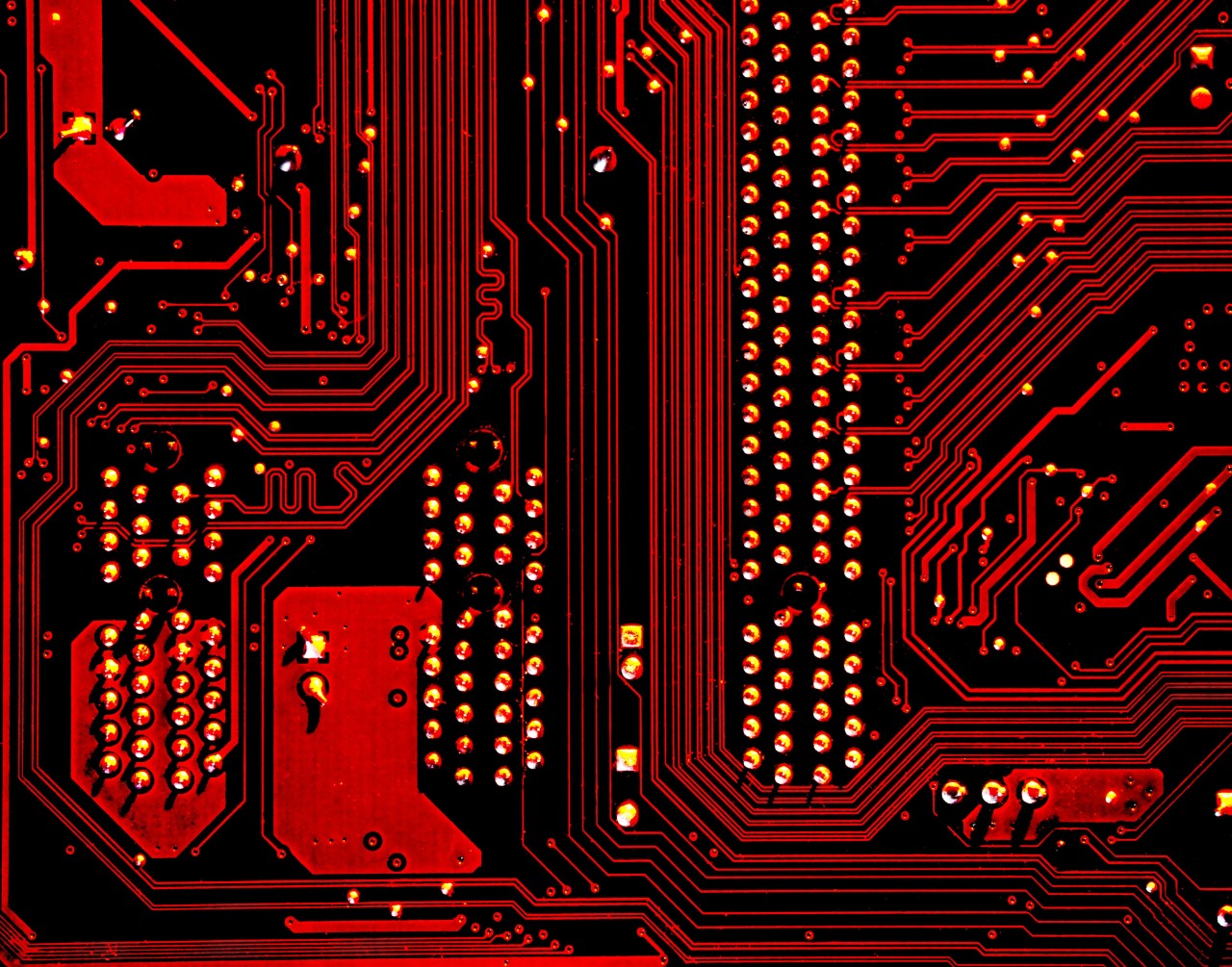 A motherboard lit in red