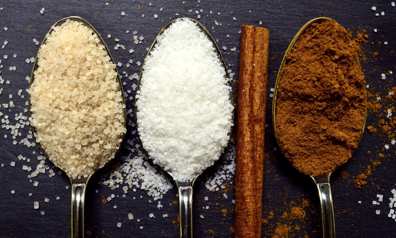 photo of different spoons with sugars and spices