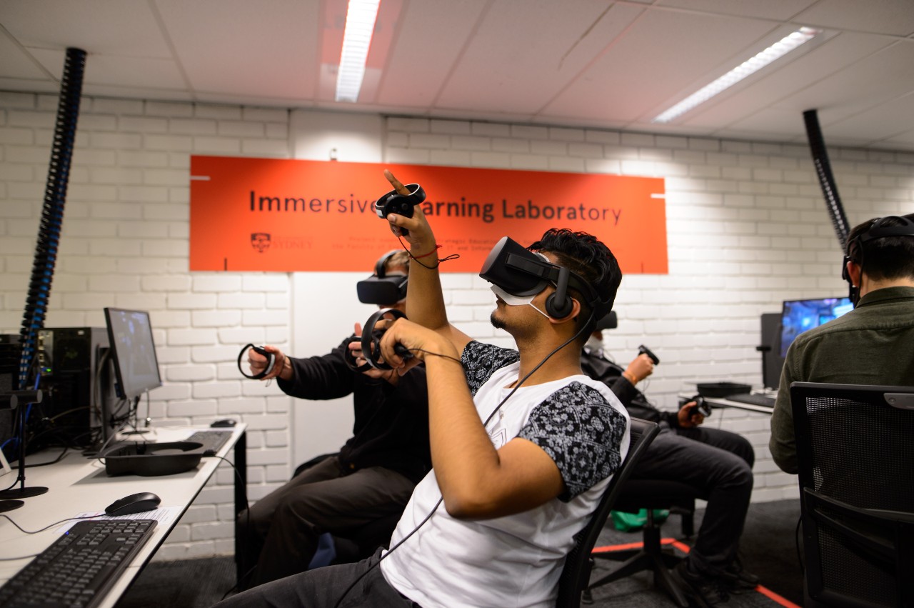 A student using an Oculus Rift headset in the new Immersive Learning Laboratory.