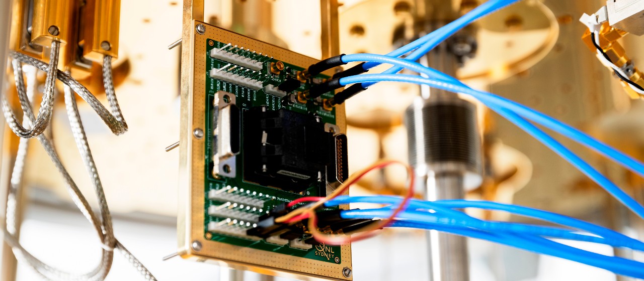 The cryogenic control platform with quantum interface chip in place in a dilution fridge. The device operates at about 0.1 Kelvin - much colder than deep space.