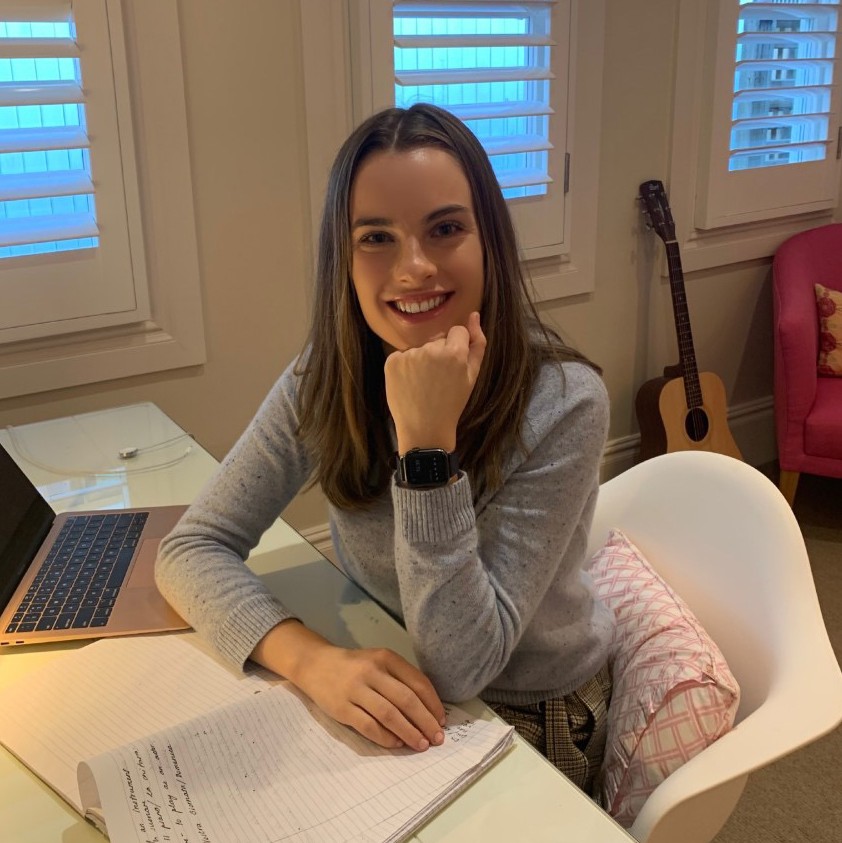 Amelia in her room while studying remotely 