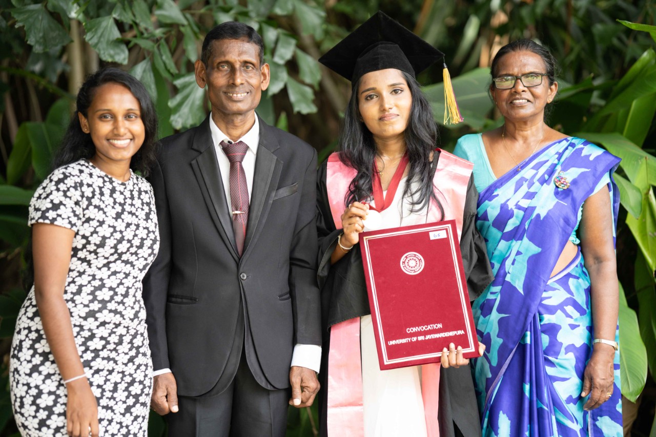 Nadeera Ashani at her graduation from the University of Sri Jayewardenebyra with her family.