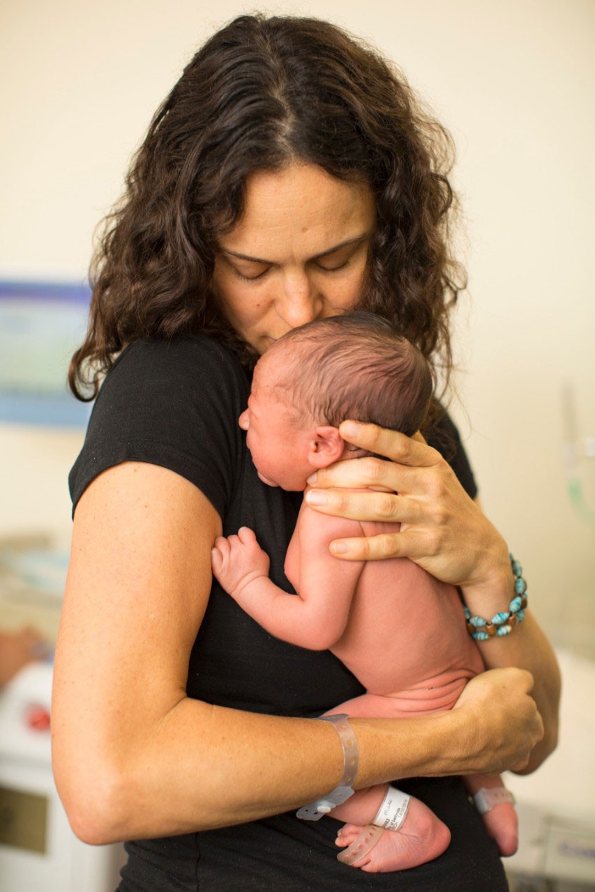 hugging a baby
