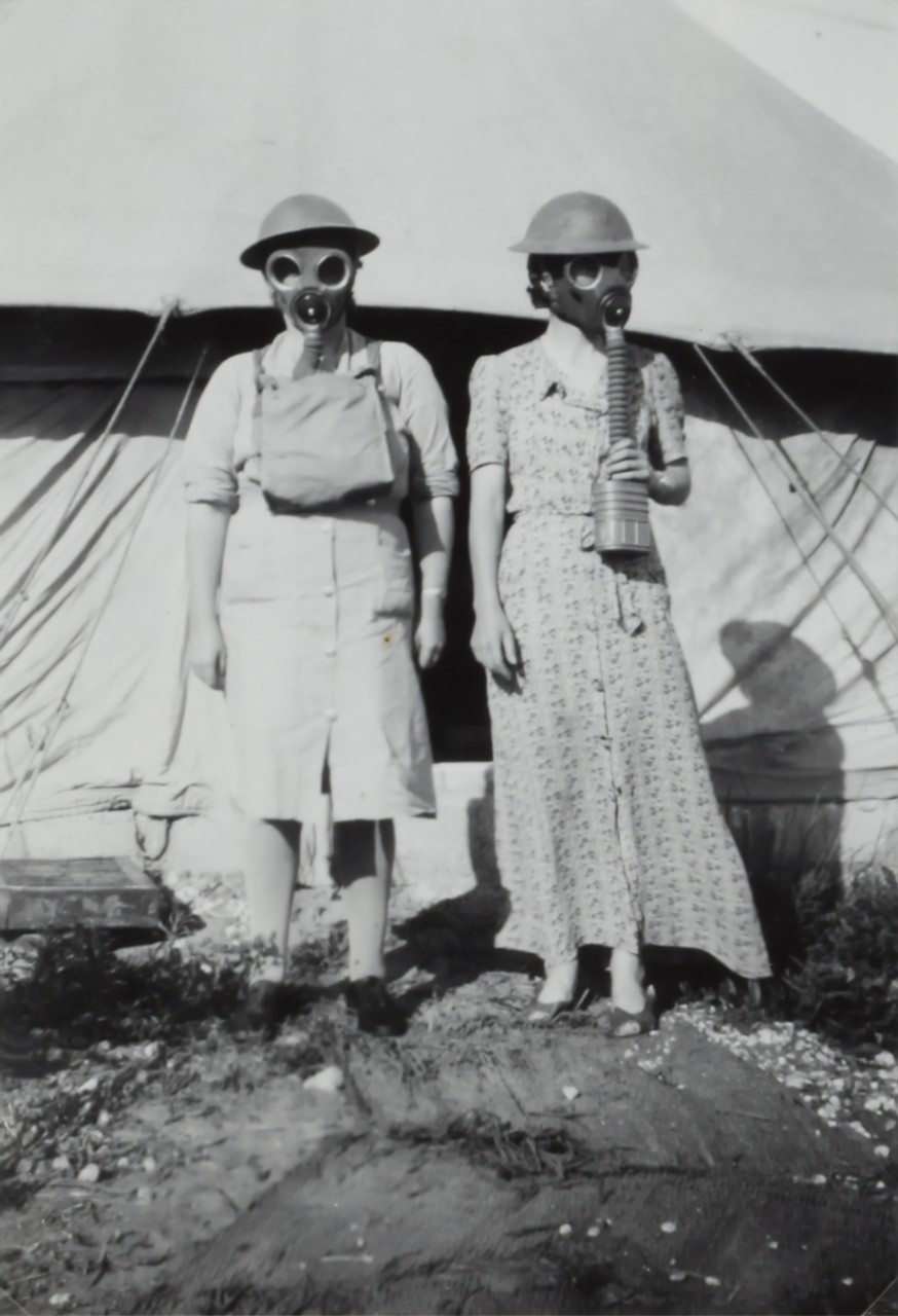 Two women wearing gas masks in Israel, World War II