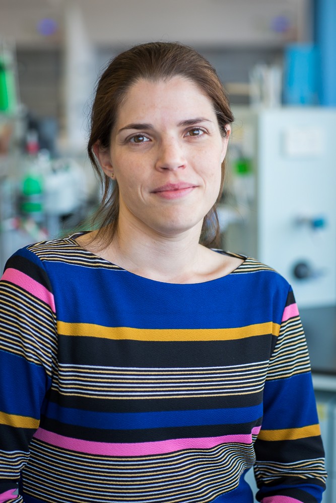 Deanna, seated in the lab.
