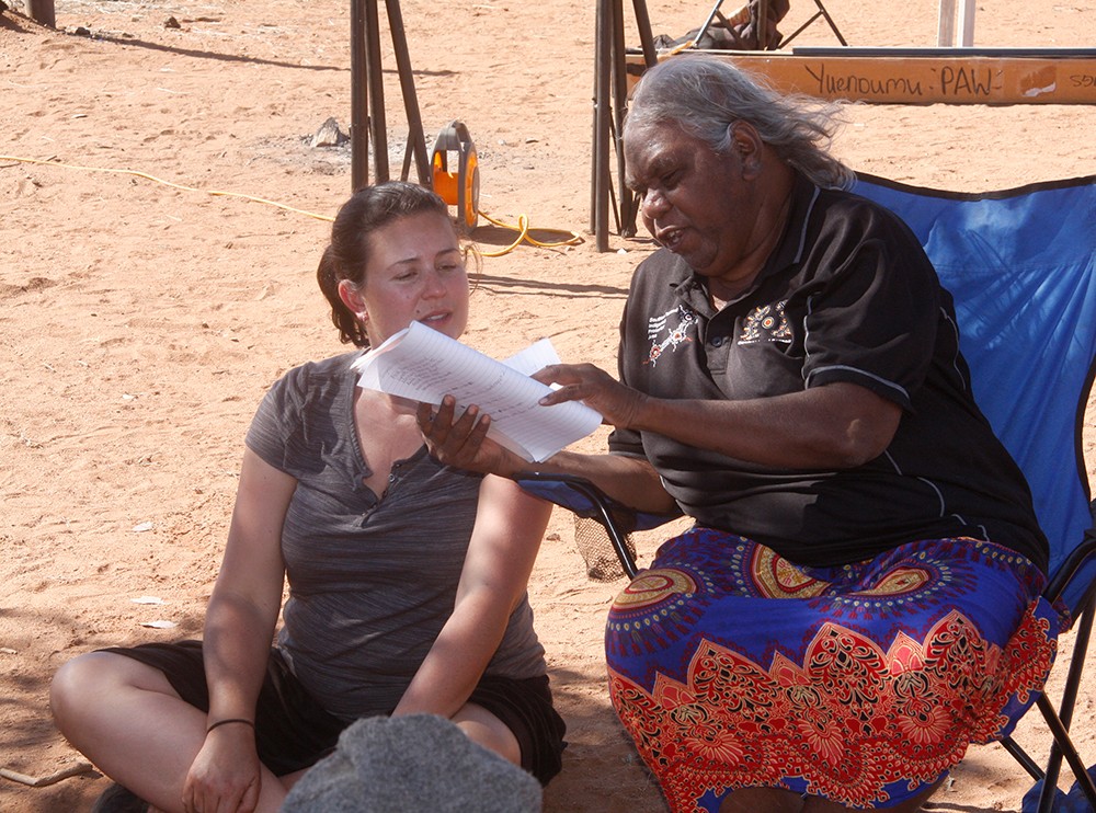Georgia Curran working with Enid Nangala Gallagher.