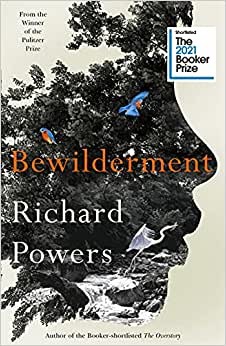 photo of a book cover with a face in profile made up of plants and leaves