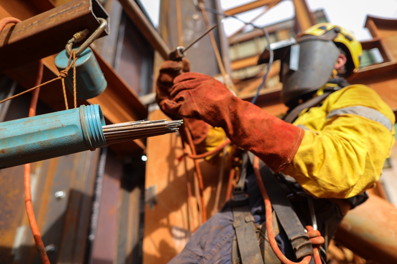 Welder on scaffolding