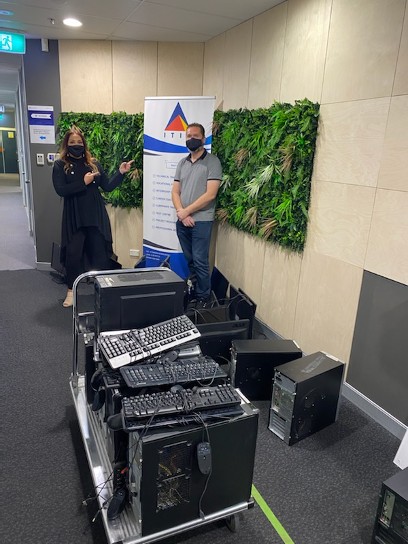 Heidi Bradshaw, CEO of Narang Bir-rong and Stephen Elbourn, Yirigaa board director and owner of ITIC Systems, Education and Research, with the computers he donated.
